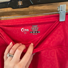 Load image into Gallery viewer, Zyia Light n Tight Cross Front Red Leopard Leggings size 6-8
